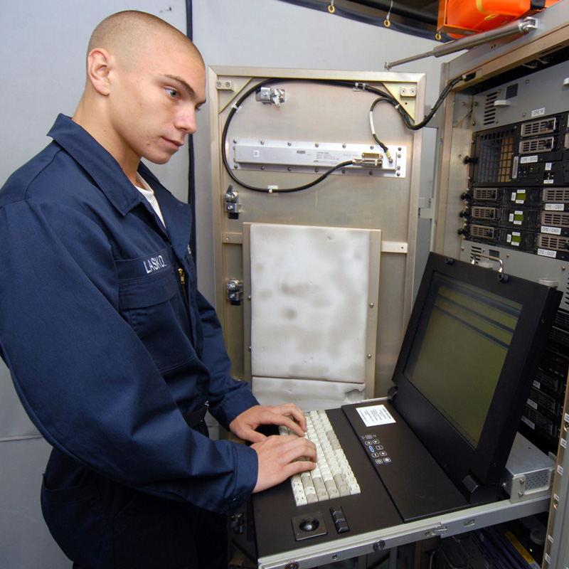 Navy technician performs server backup
